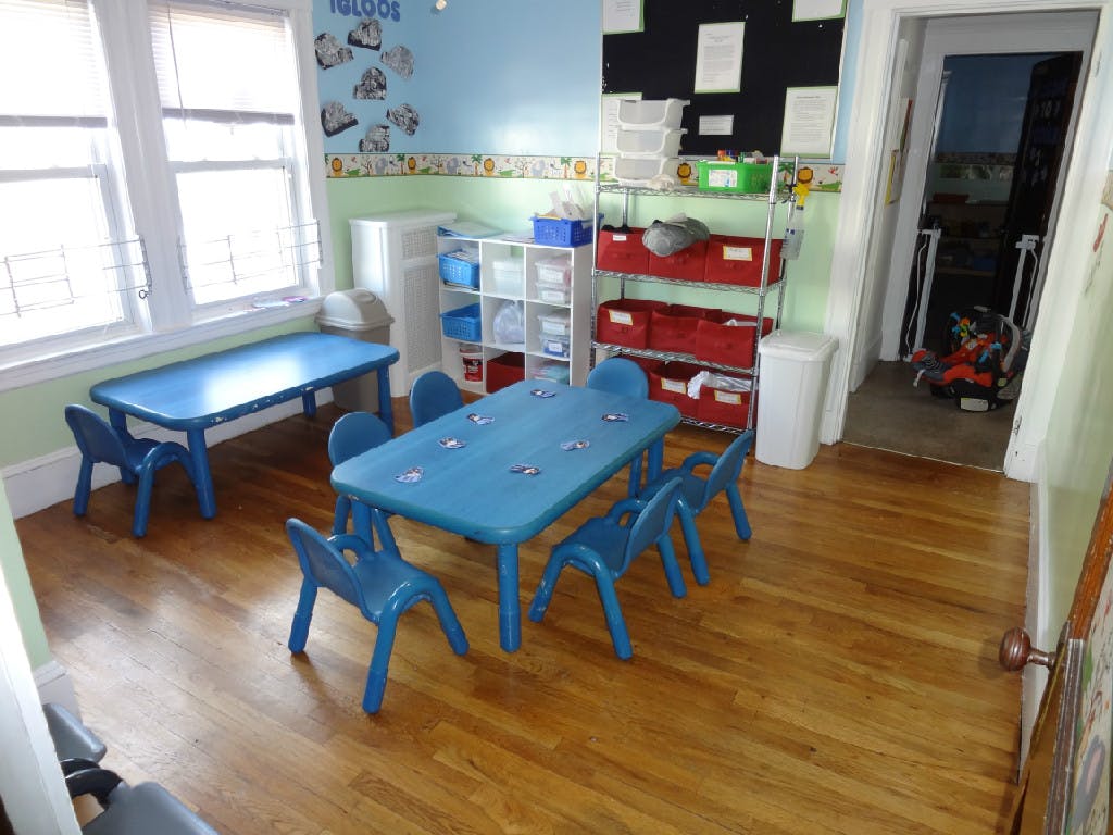 Classroom with blue tables and chairs
