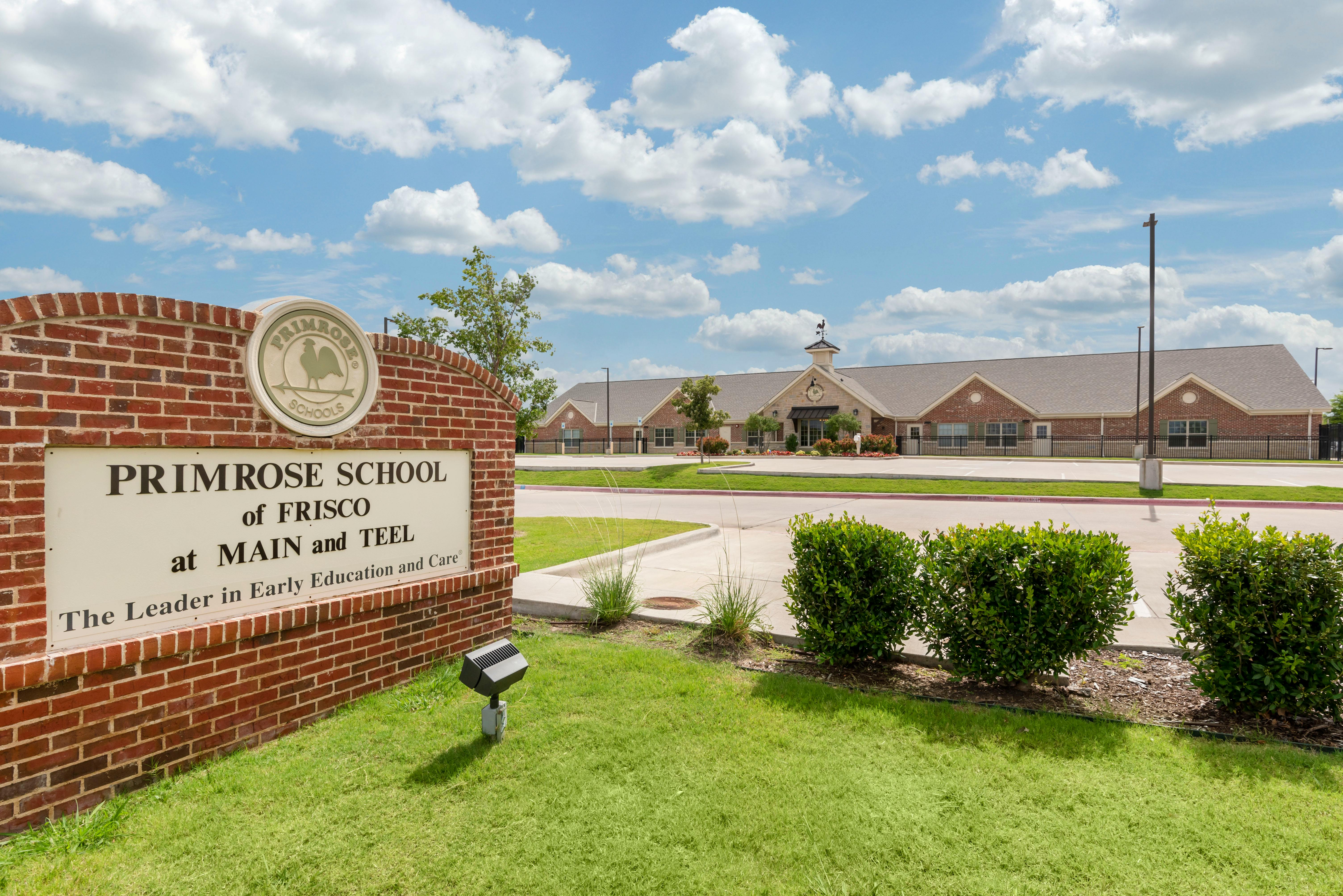 Primrose School of Frisco sign in front of a school building