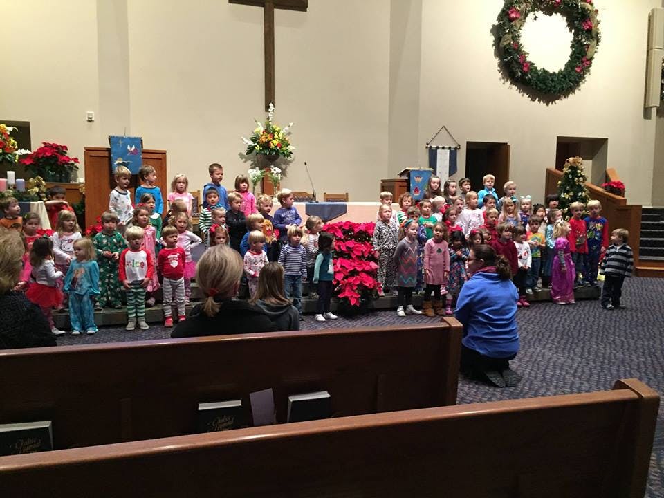 Group of children on a stage in a church