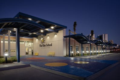 Exterior of The Rise School building at night