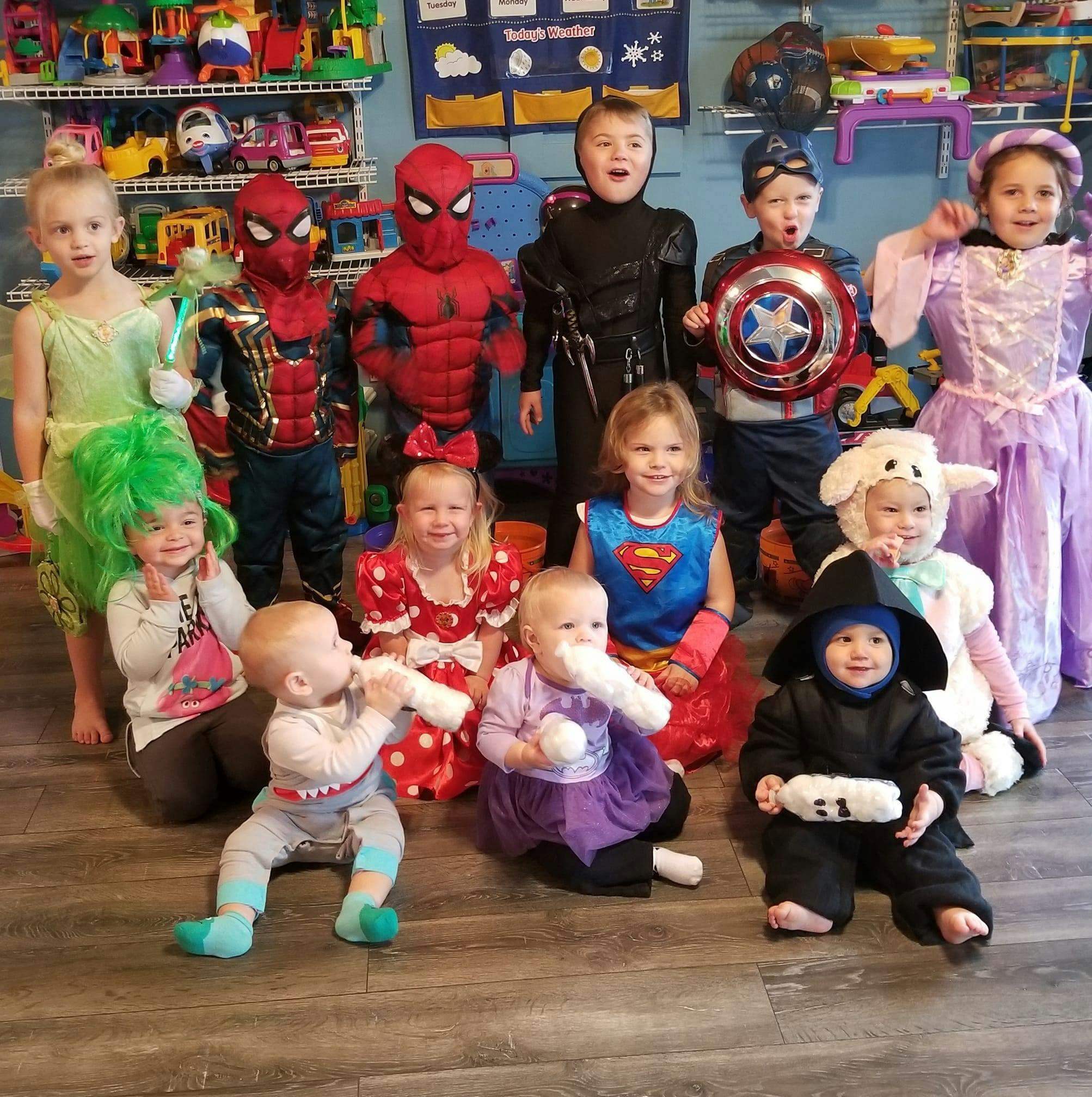Group of children and babies in various costumes