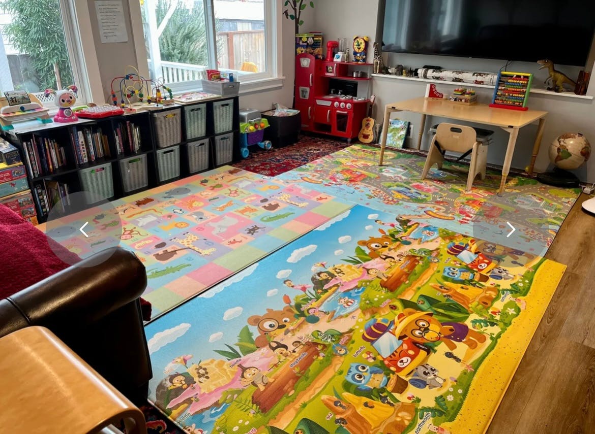 Playroom with colorful playmats on the floor