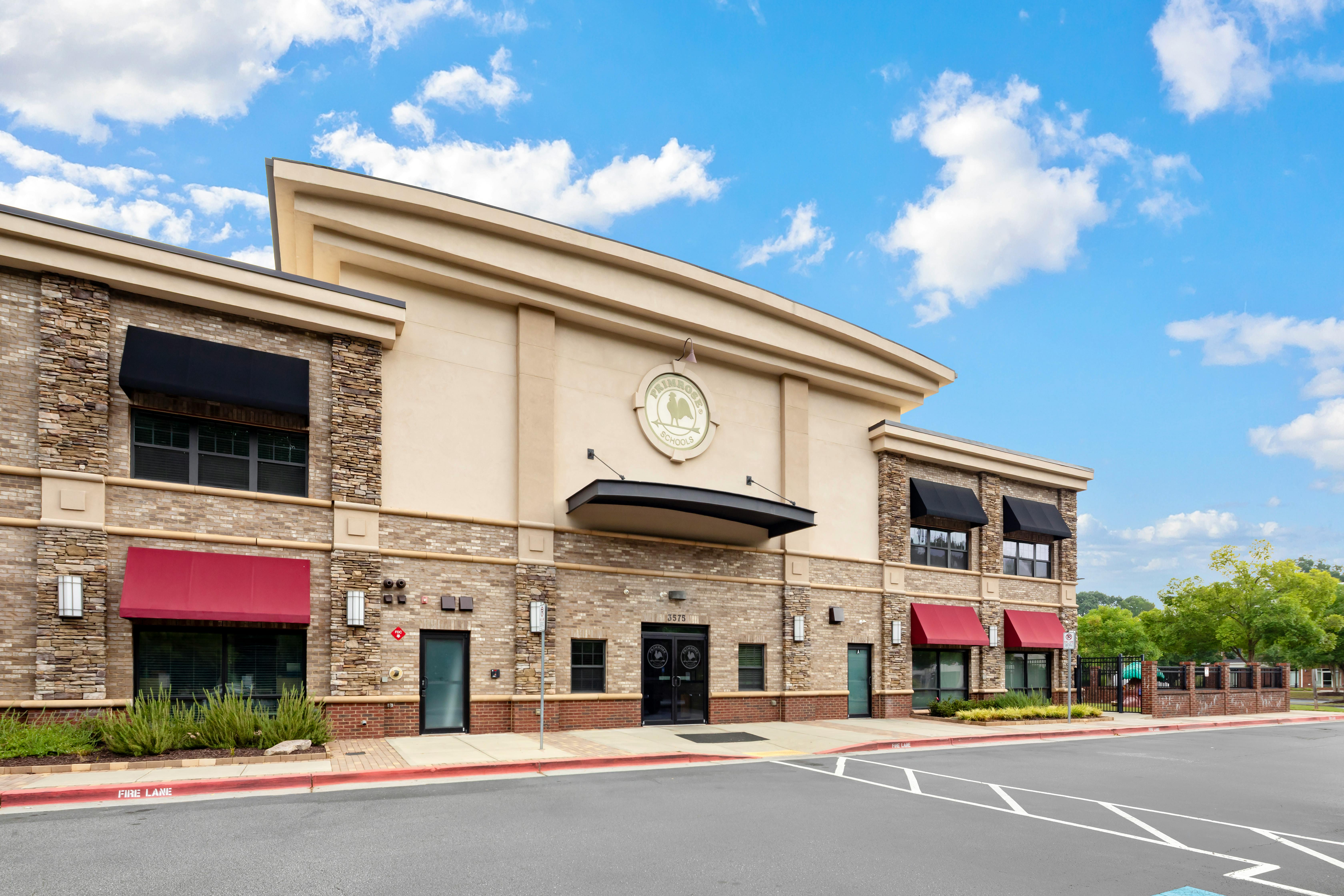 Exterior of a building with brick and stone accents, 