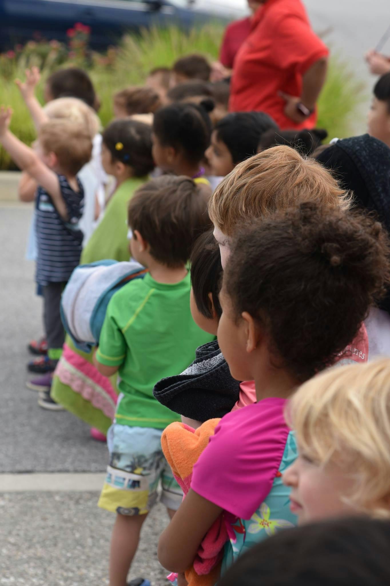 Line of children standing outdoors