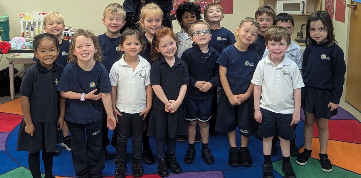 Group of children standing and smiling