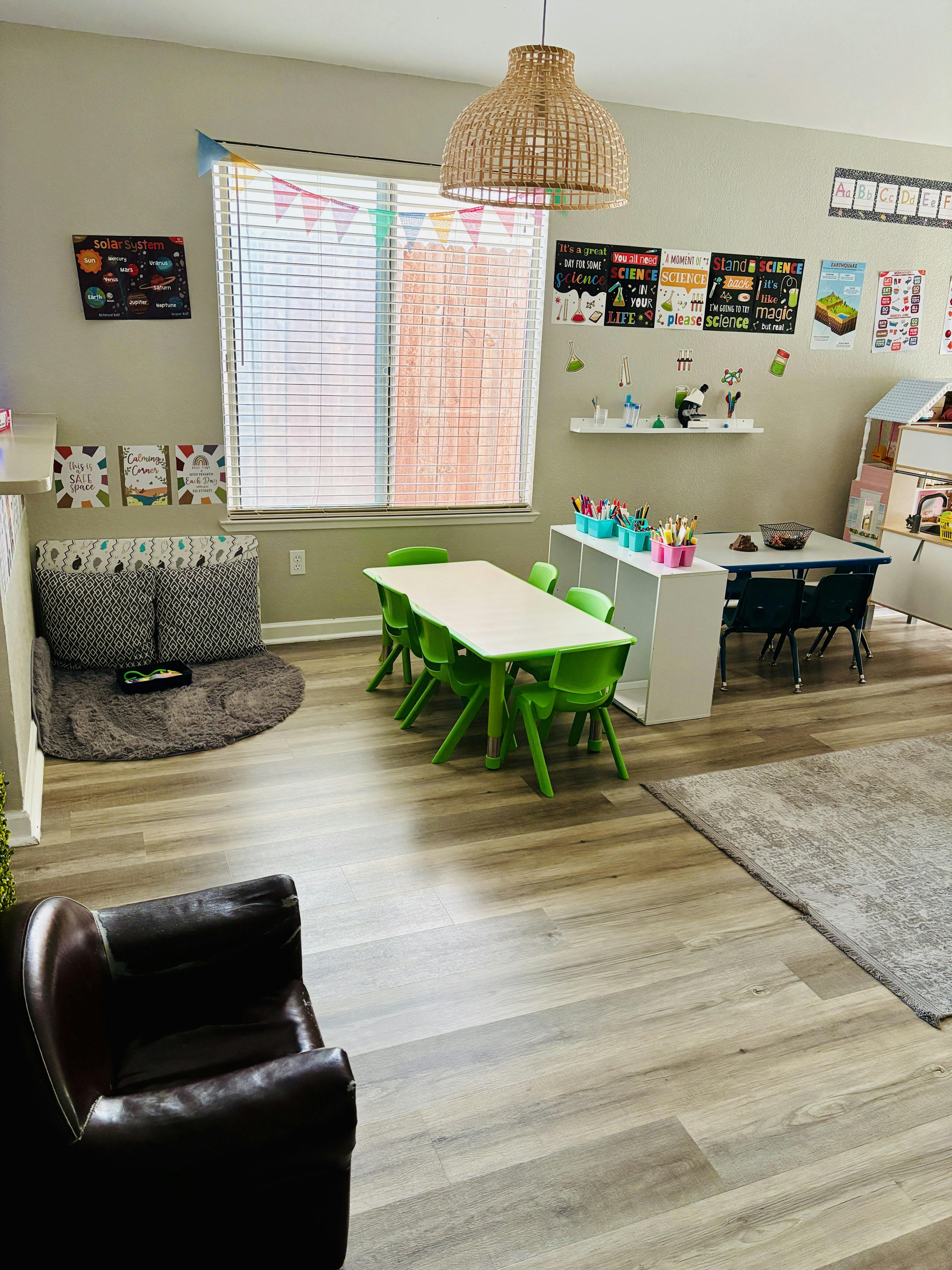 Classroom interior with small tables and chairs for children