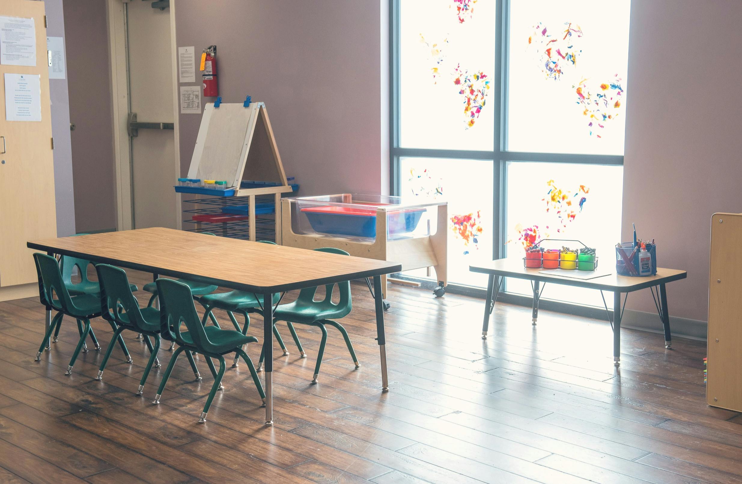 Empty classroom with tables and chairs