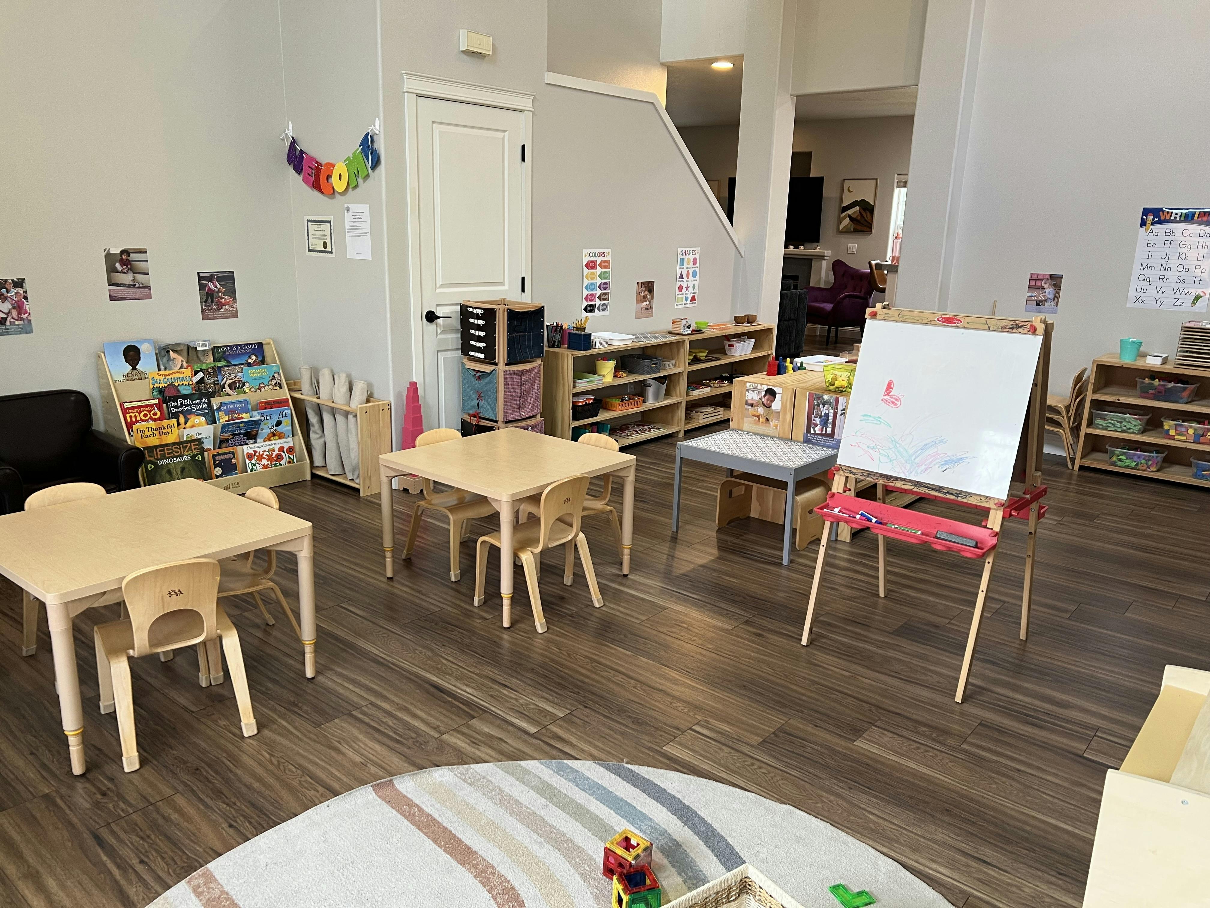 Classroom interior with small tables and chairs for children
