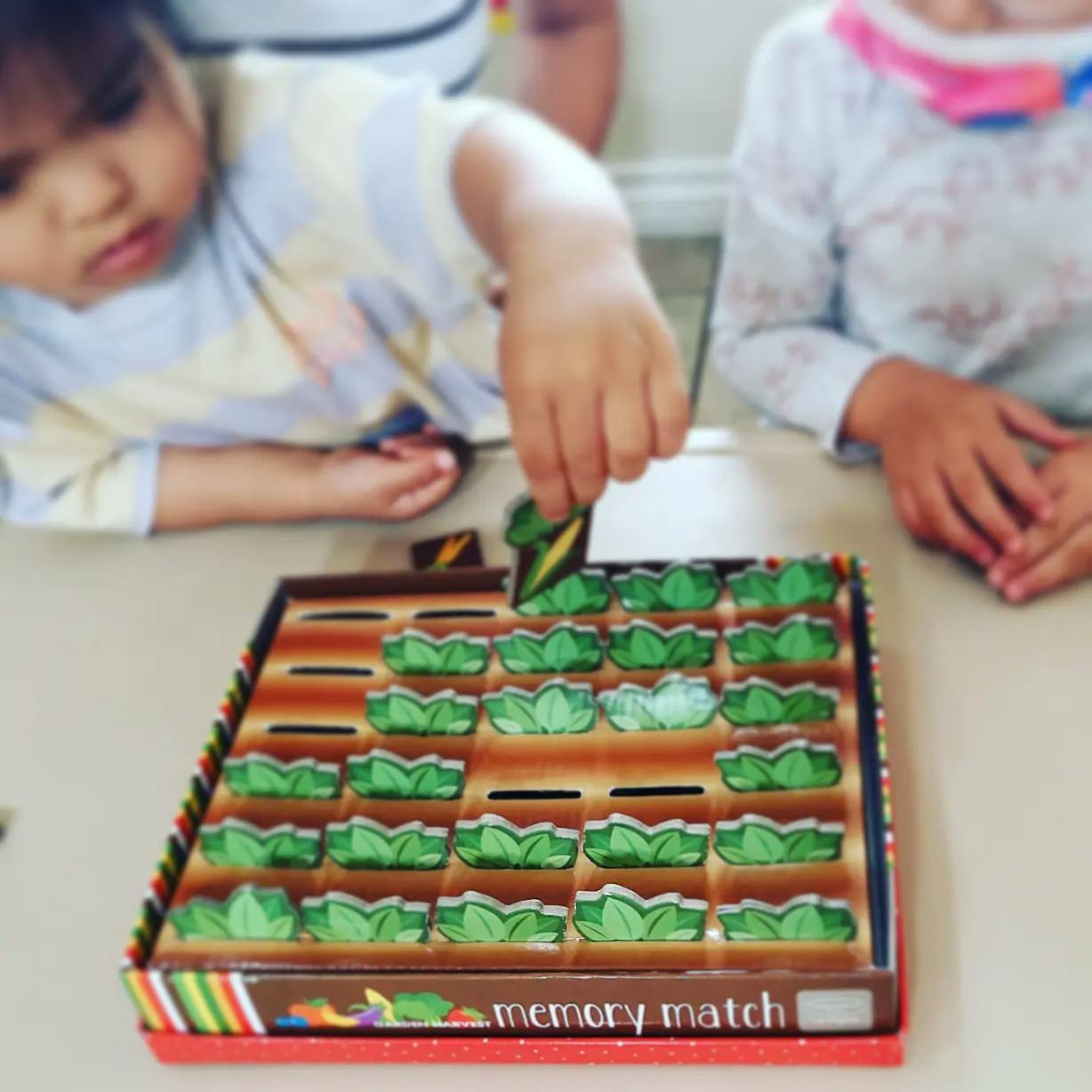 Child playing a memory match game