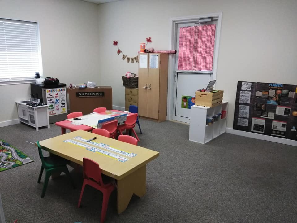 Classroom with small tables and chairs