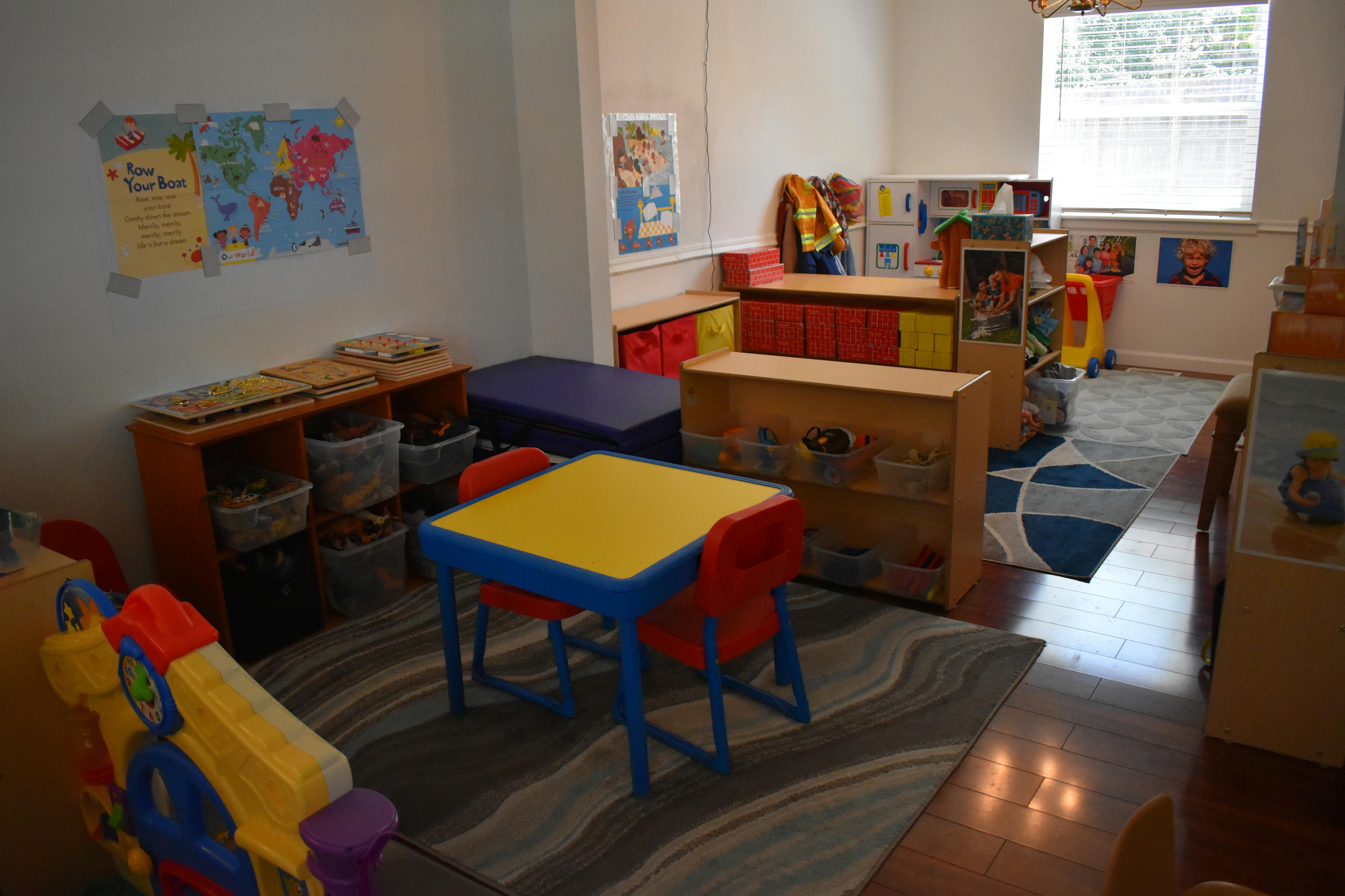 Children's classroom with small tables and chairs