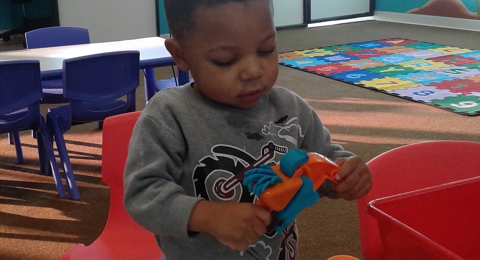 Child playing with a toy