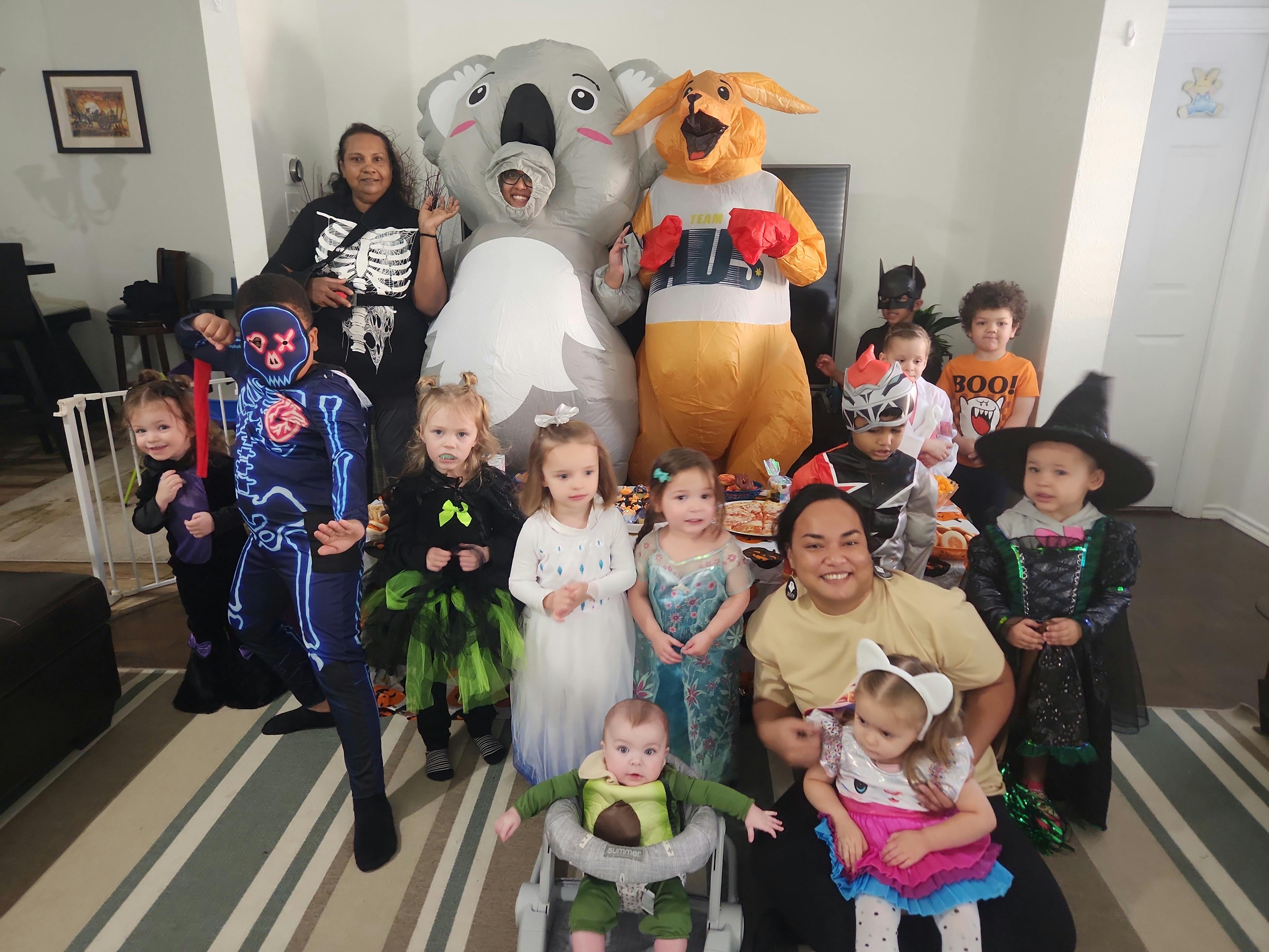 Group of people and children in various costumes