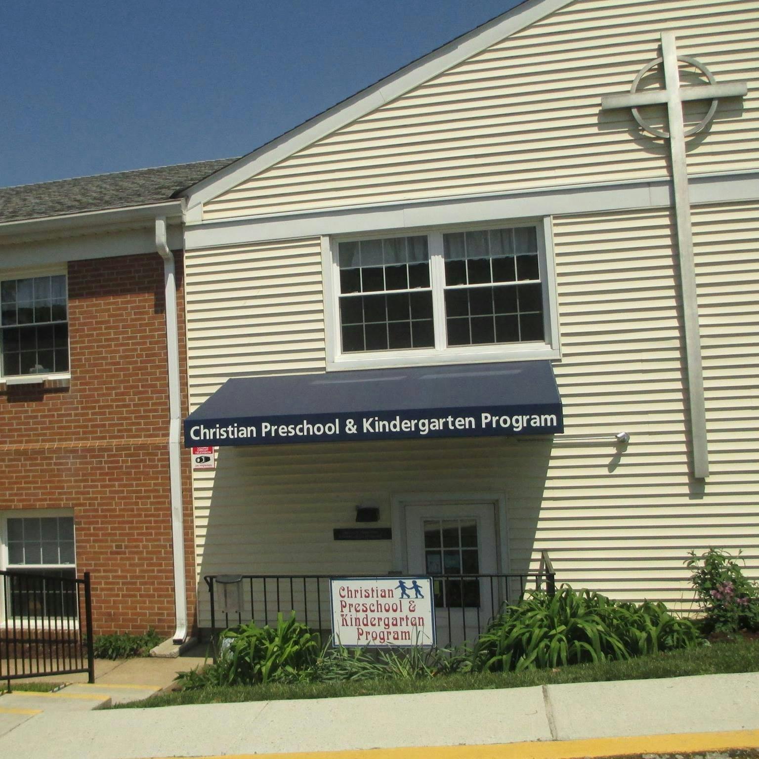 Building with sign reading Christian Preschool & Kindergarten Program
