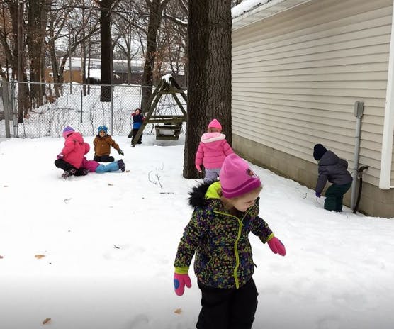Children playing in the snow