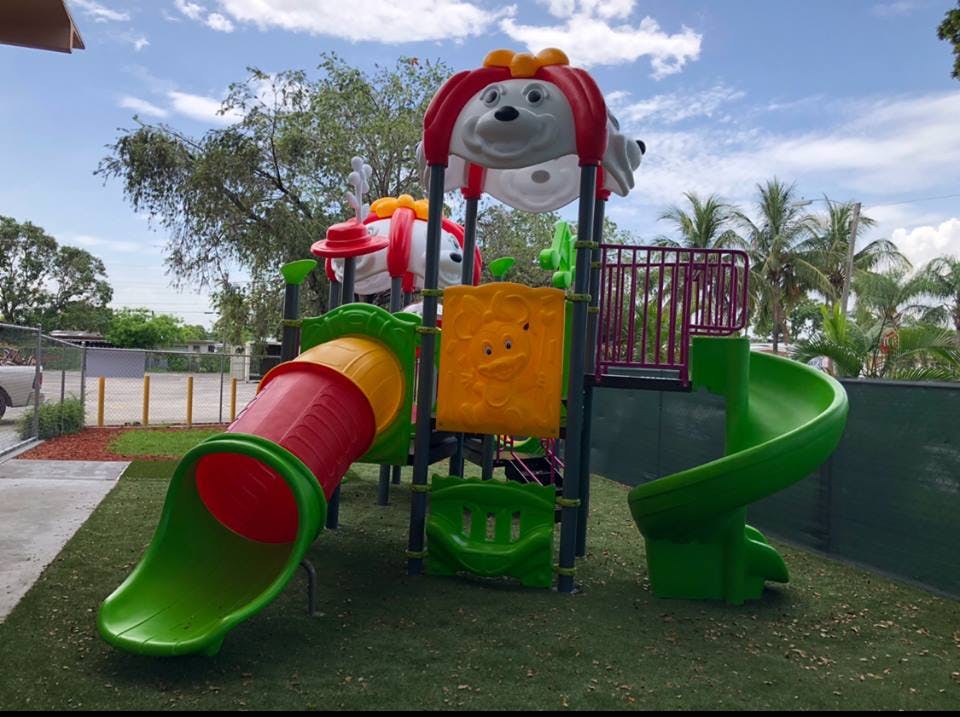 Playground with slides and climbing structure