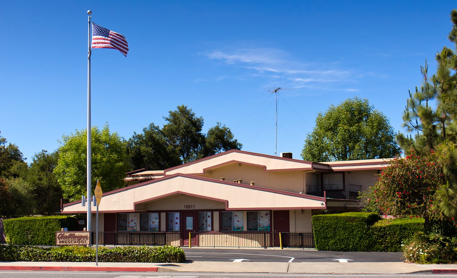 Building with an American flag on a flagpole in front