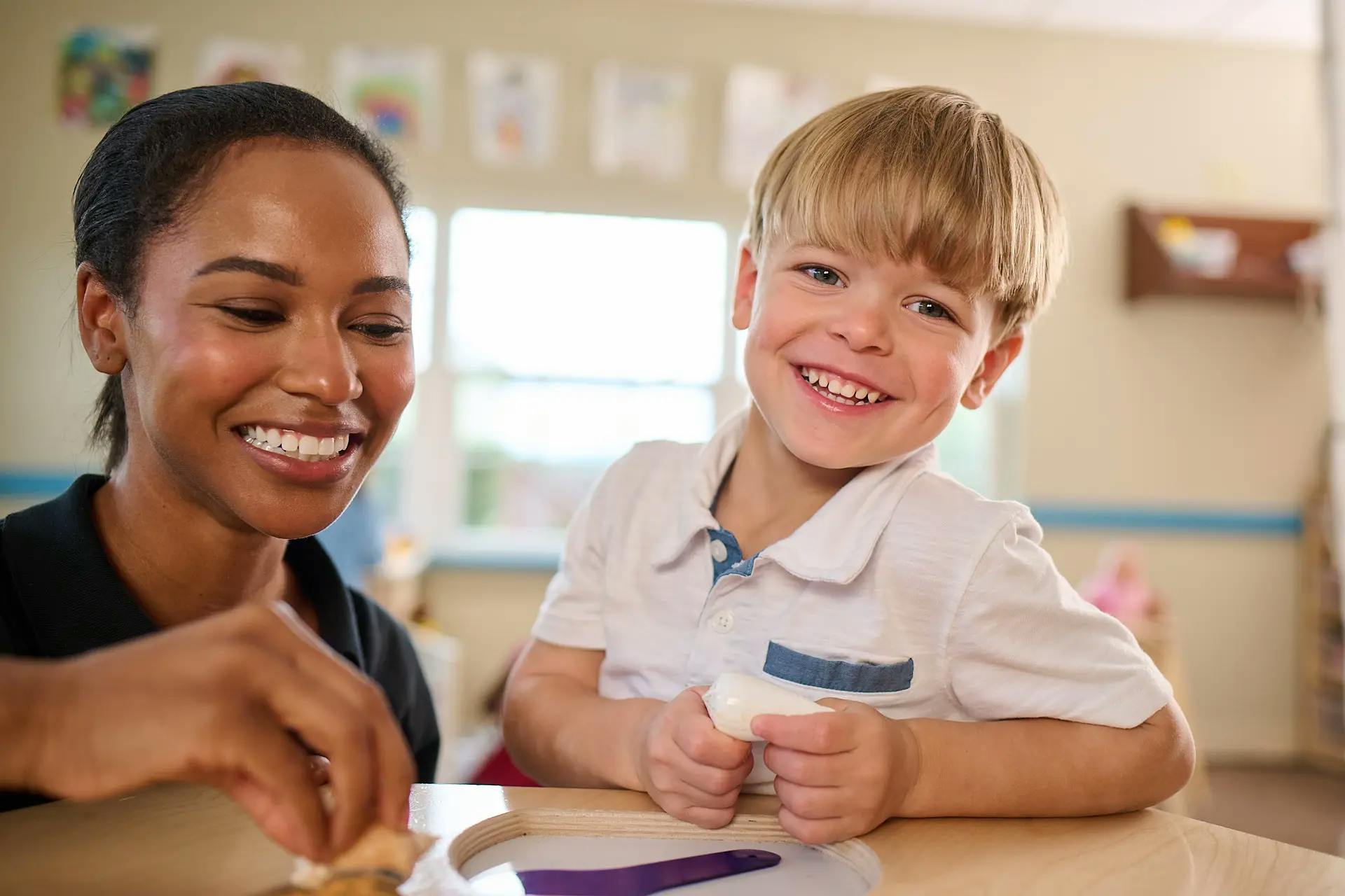 Adult and child at a table