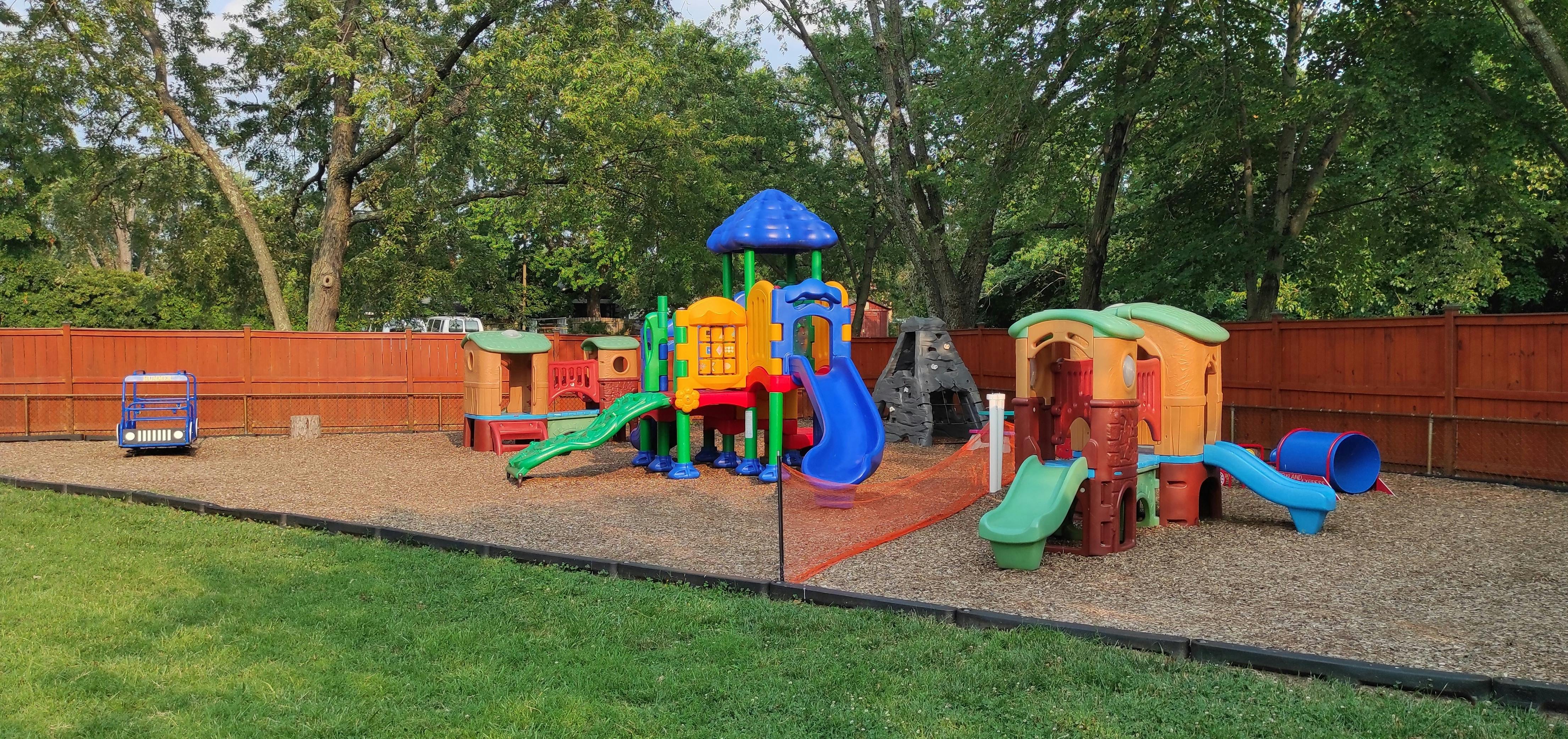 Outdoor playground with colorful slides and play structures