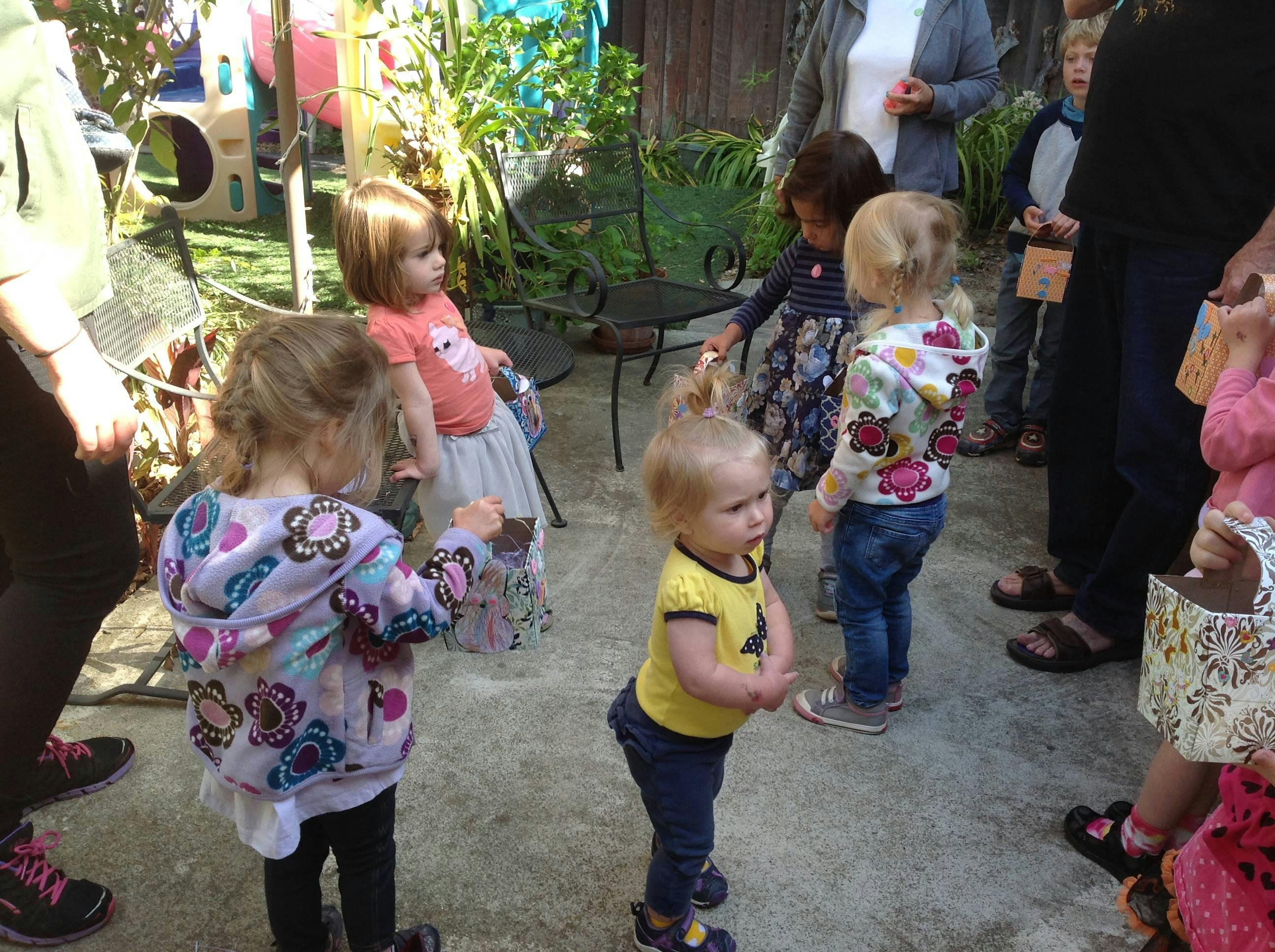 Group of children and adults standing outdoors
