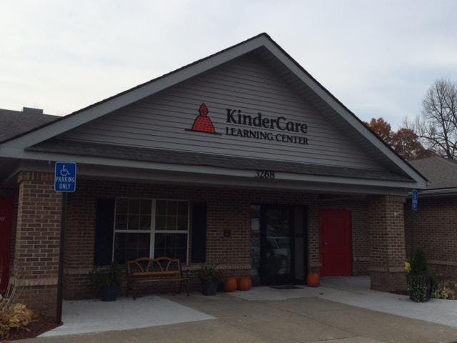 KinderCare Learning Center building with "KinderCare Learning Center" sign