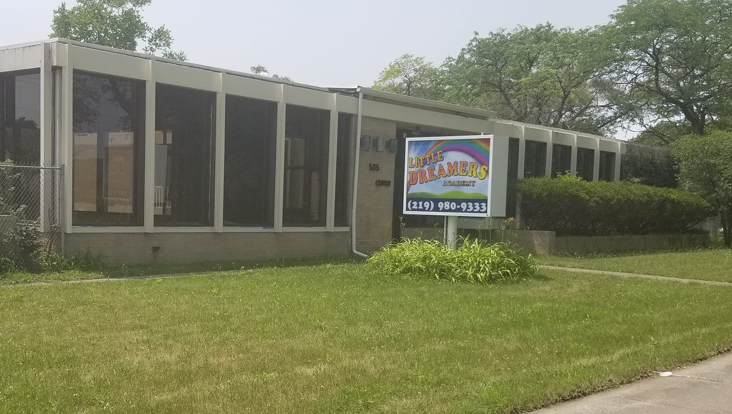 Building with a sign that reads "Little Atlantis Learning Center"