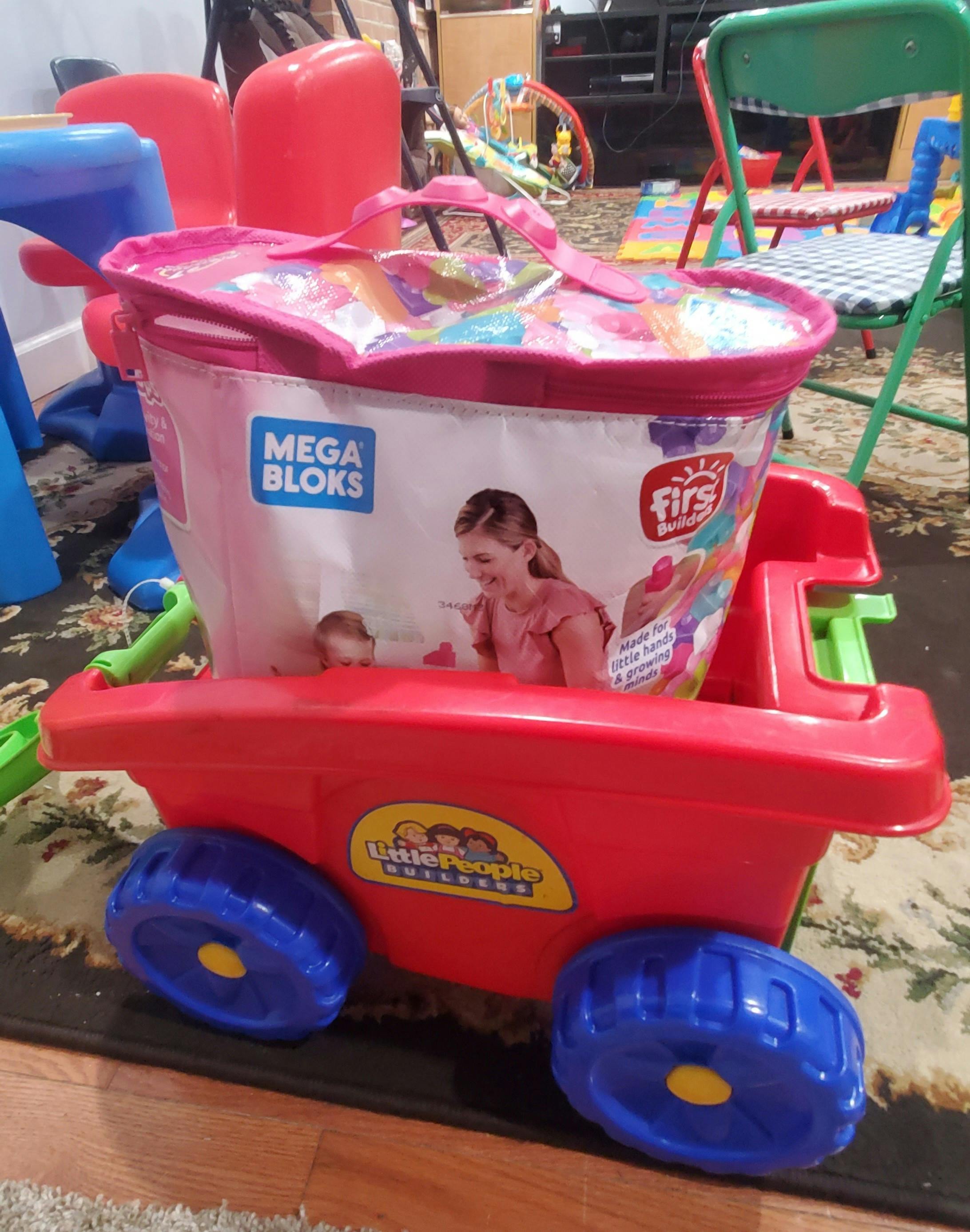 Red toy wagon with a Mega Bloks container