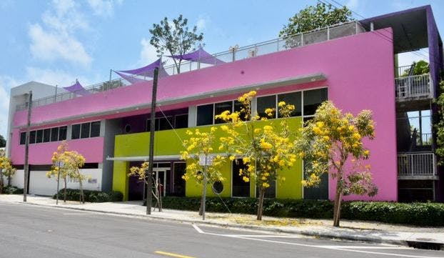 Building with pink and lime green exterior