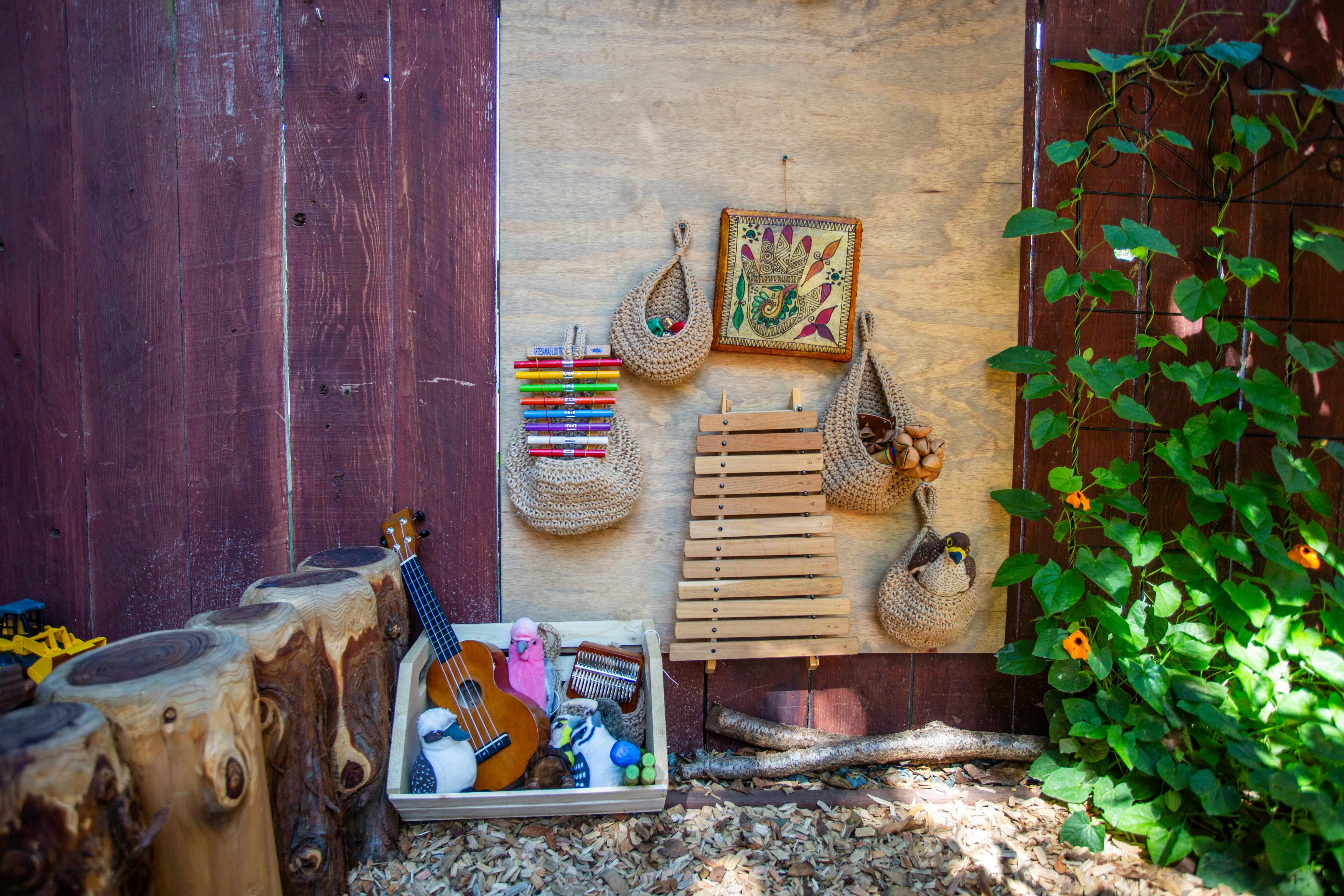 Musical instruments and crafts hanging on a wall