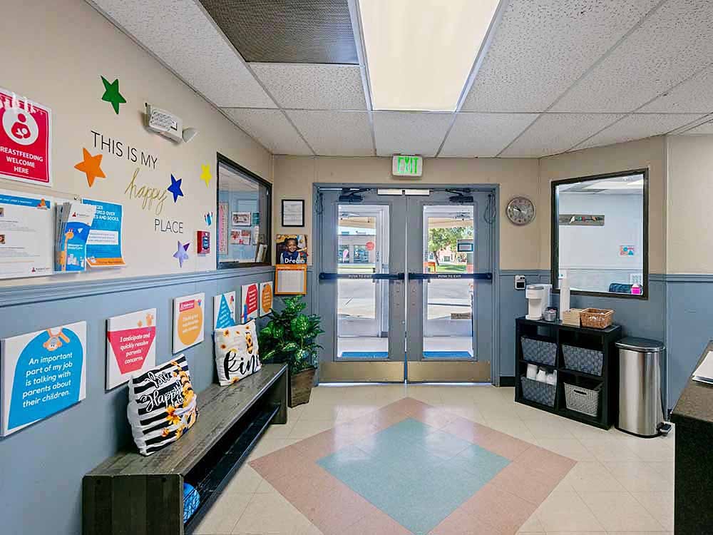 Lobby area with a wall sign reading "THIS IS MY happy PLACE"