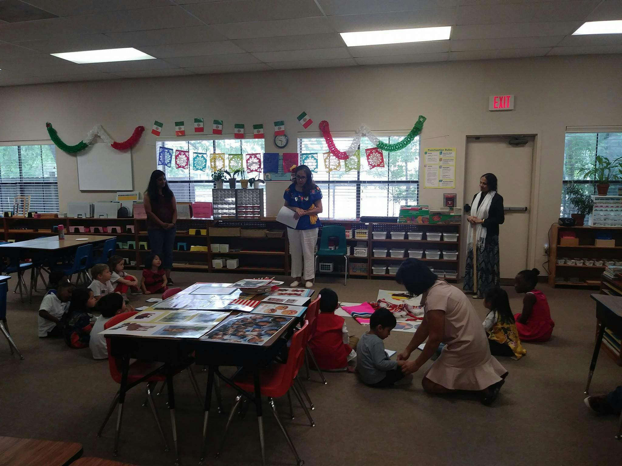 Adults and children in a classroom