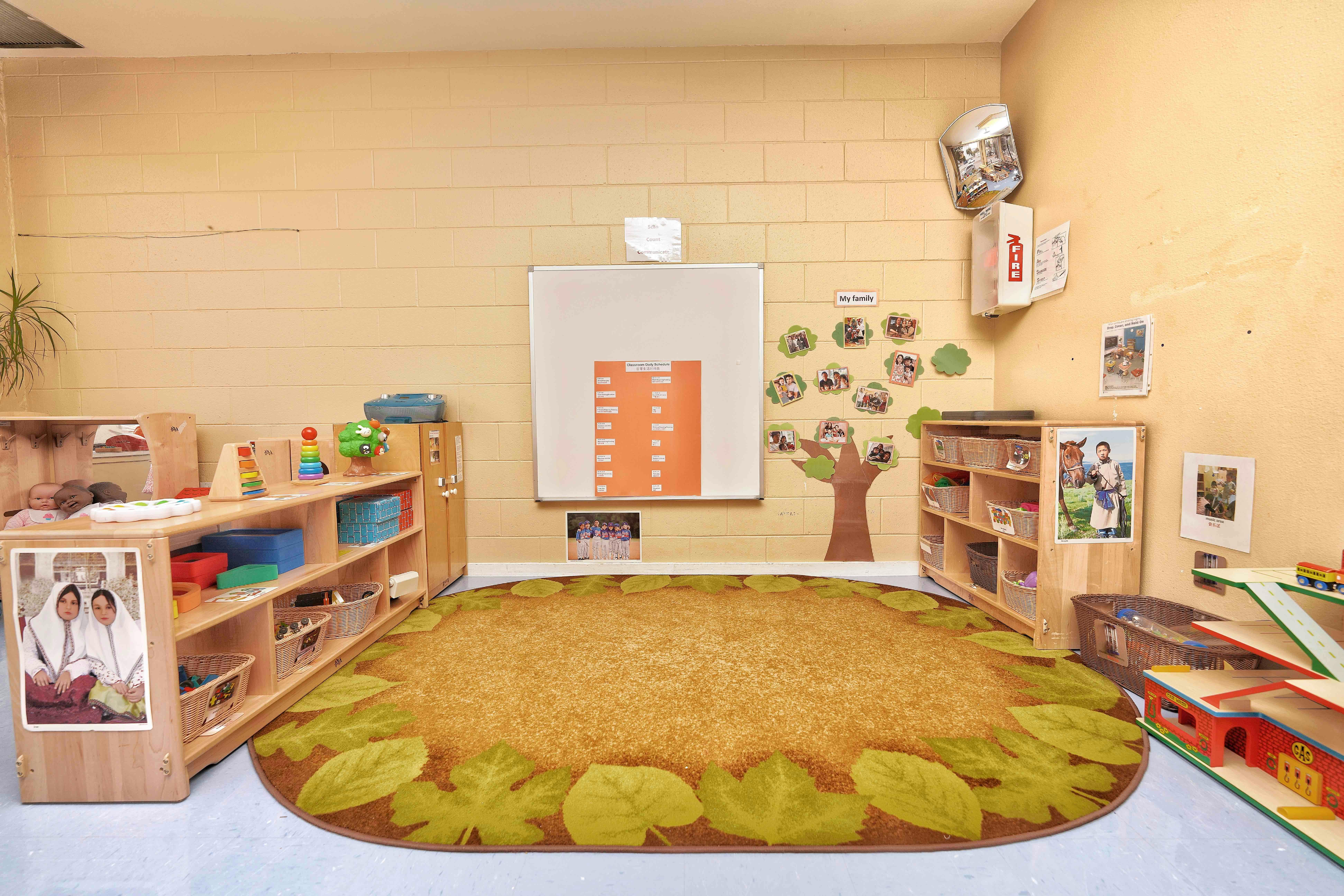 Classroom interior with educational displays and storage shelves