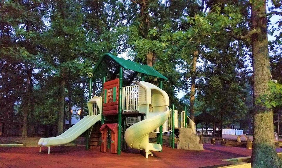Playground structure with slides and climbing areas