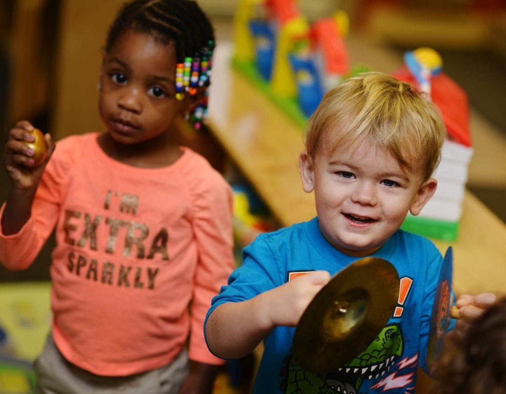 Two children playing with toys