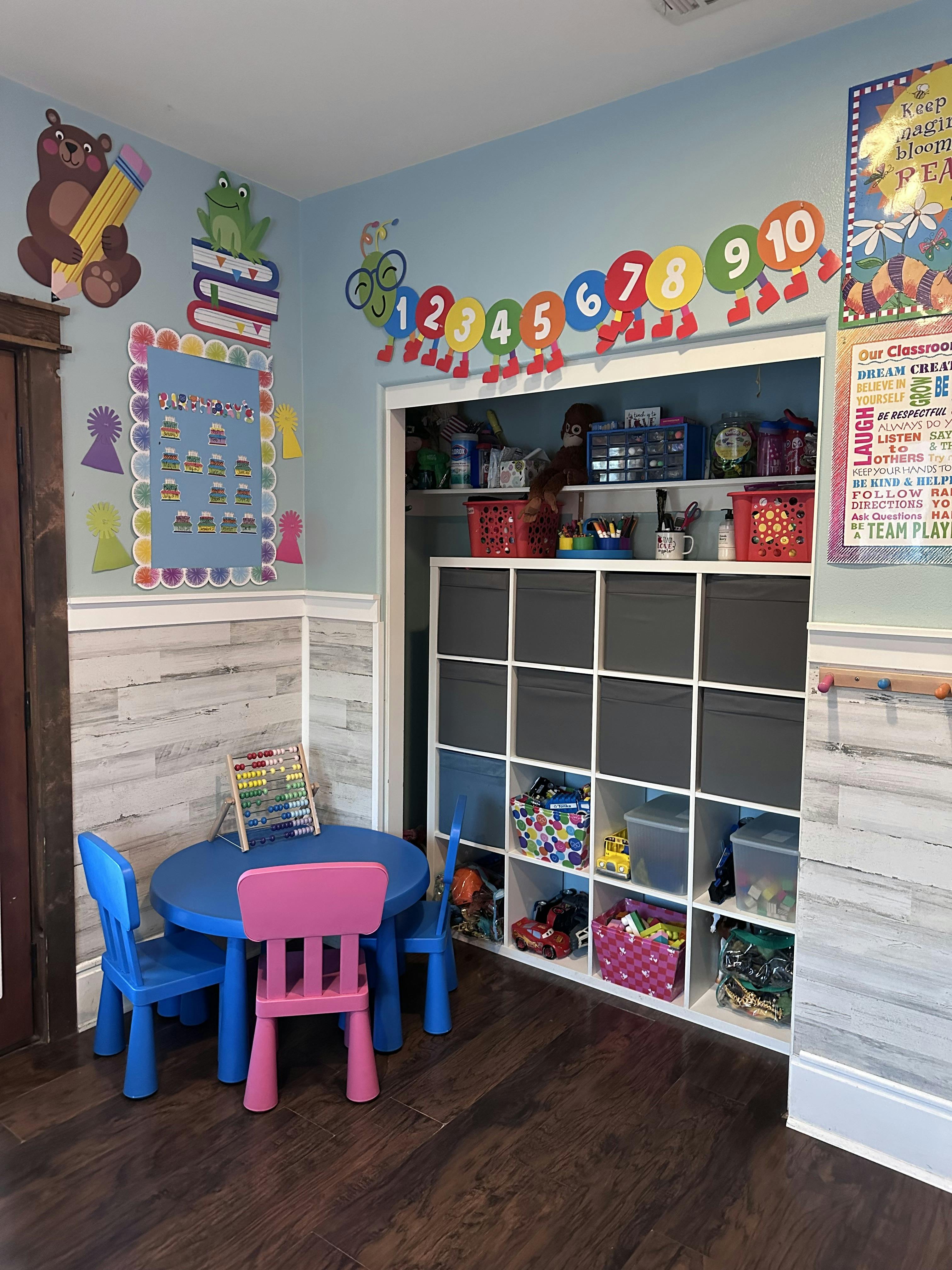 Classroom corner with small table and chairs and a cubby storage unit