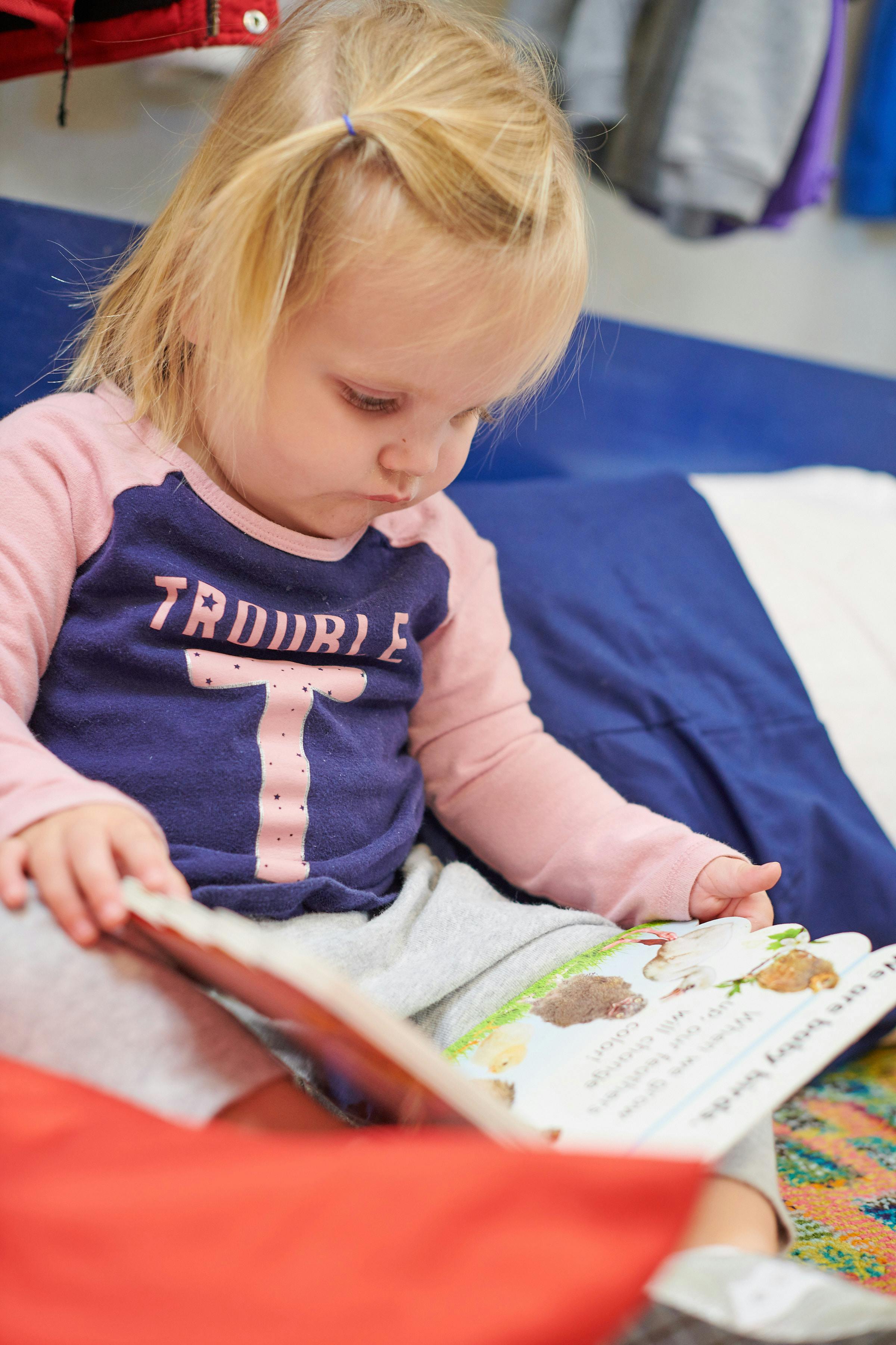 Child reading a book