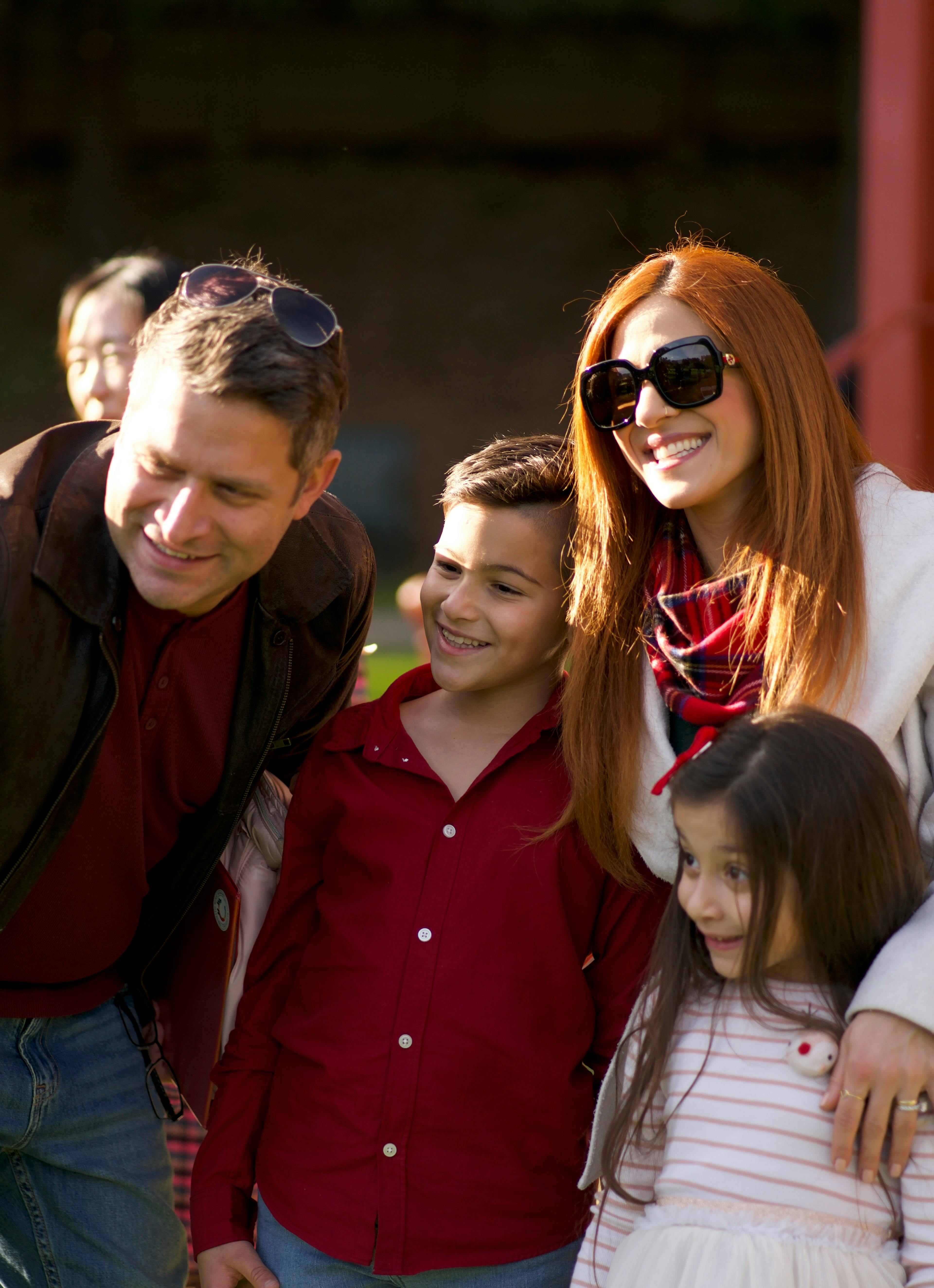 Man, woman, and two children standing together
