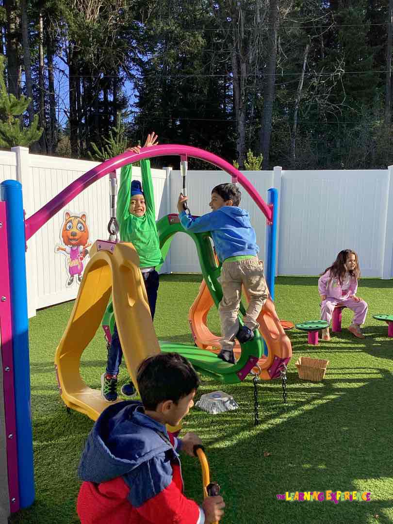 Children playing on a colorful outdoor playground