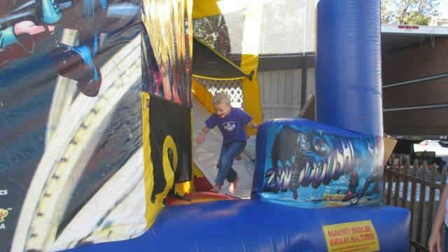 Child jumping on an inflatable bounce house