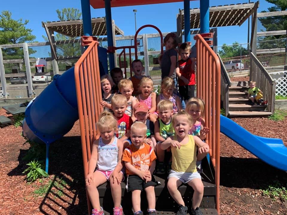 Group of children on a playground structure