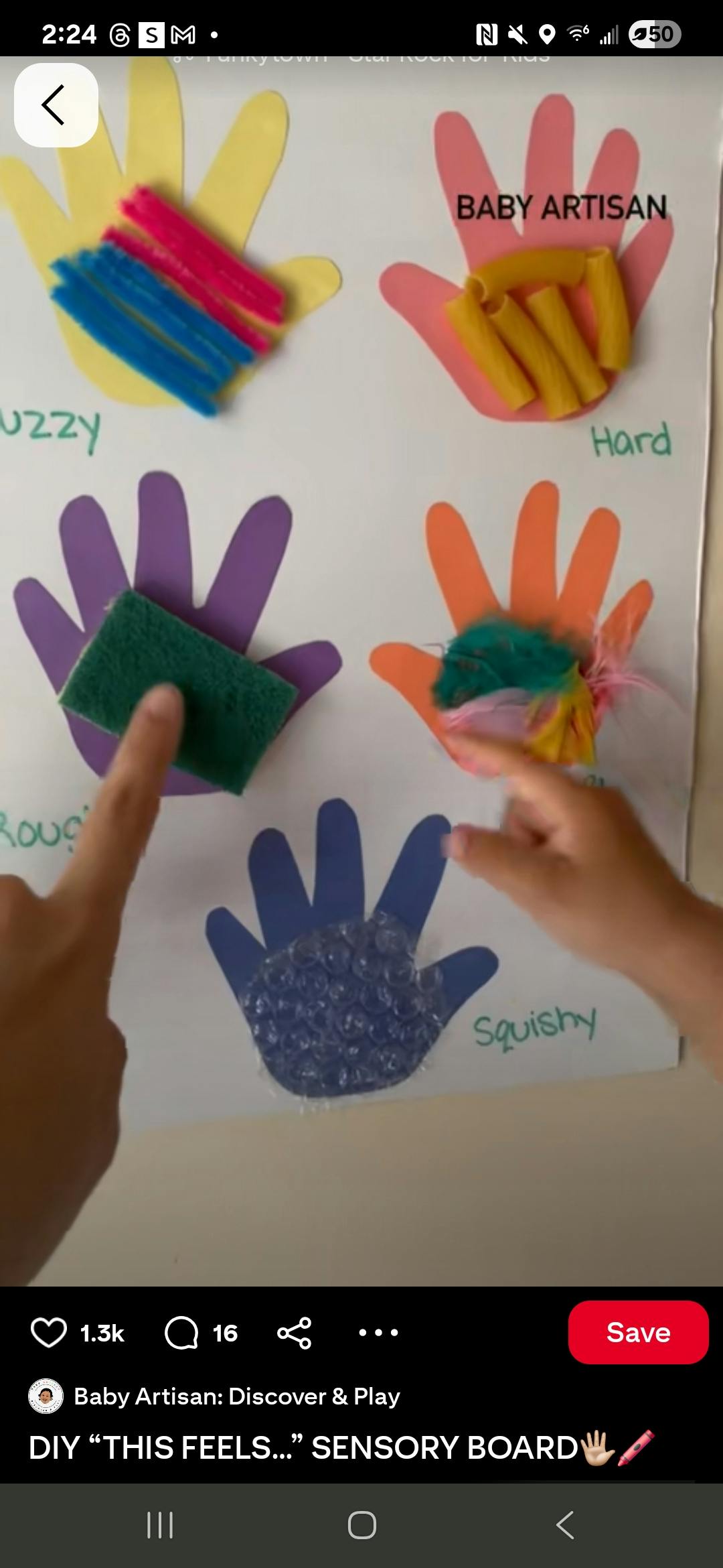 Person touching a sensory board with various textures on hand cutouts