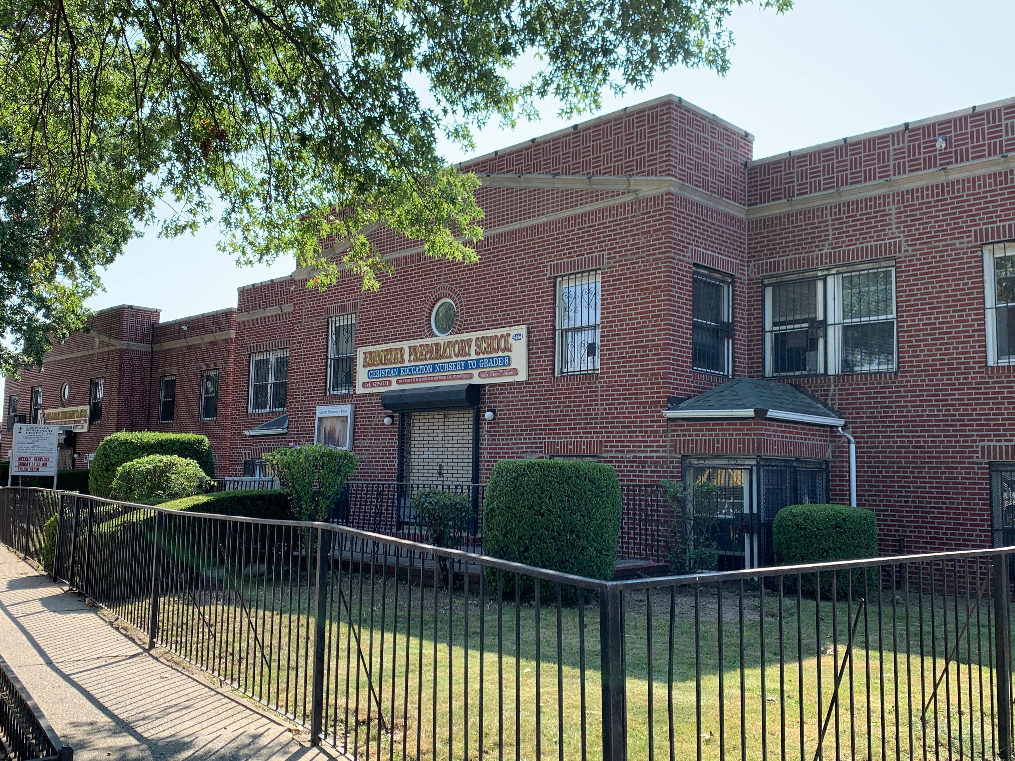 Brick building with a sign that reads "UNITED CHRISTIAN CHURCH"
