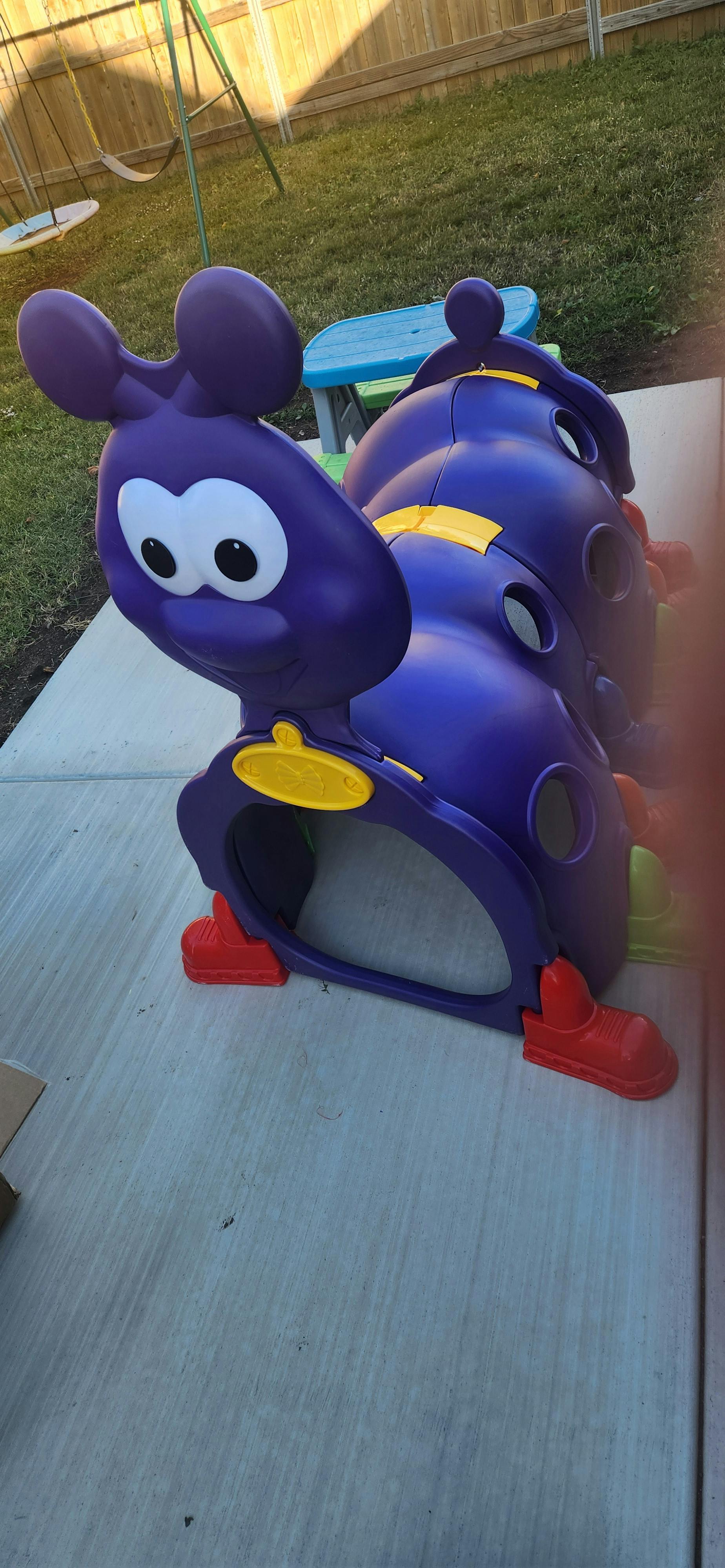 Purple caterpillar playground tunnel