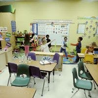 Children playing in a classroom
