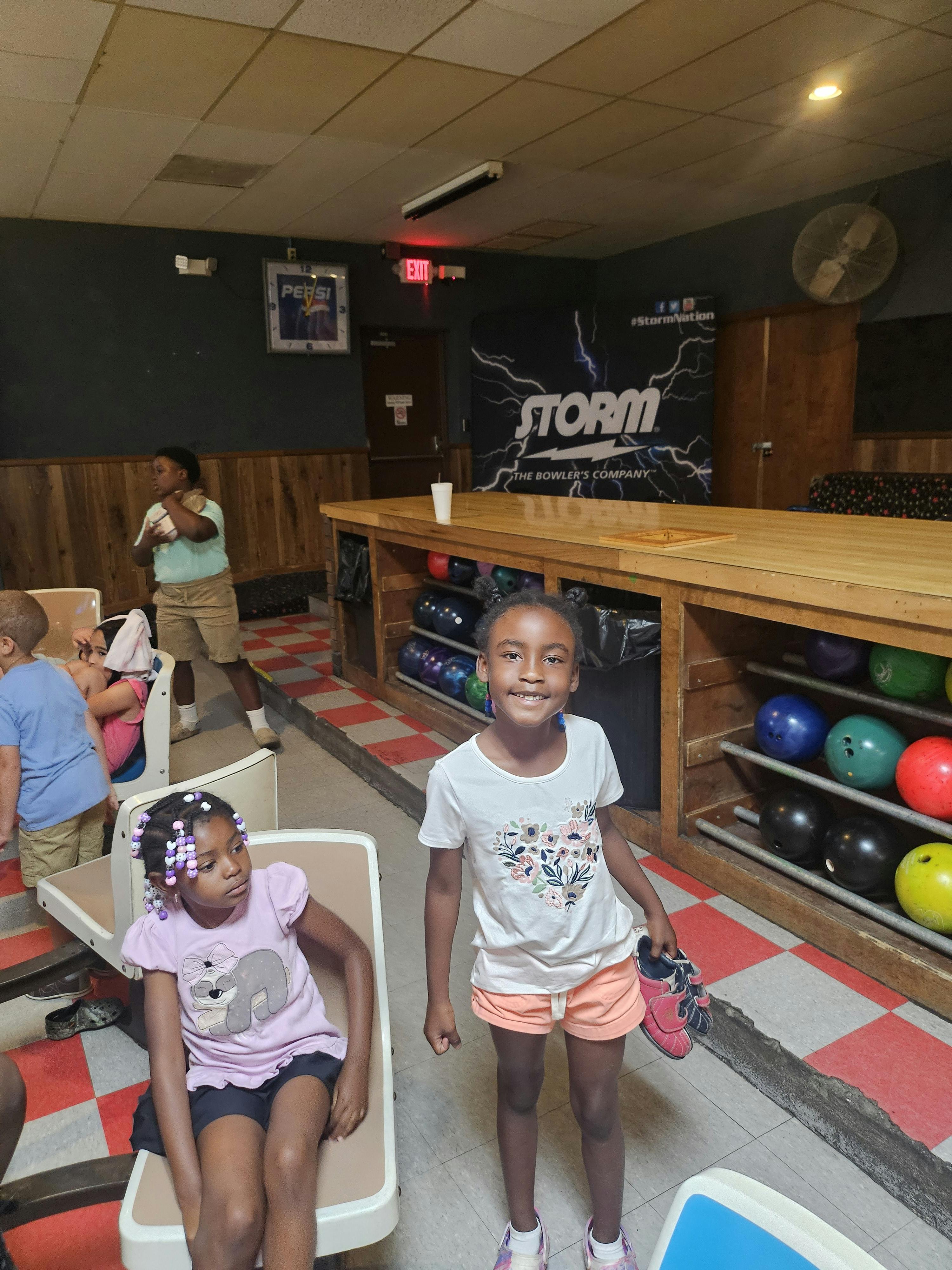 Children in a bowling alley