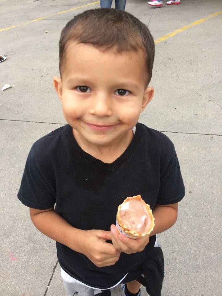 Child holding an ice cream cone