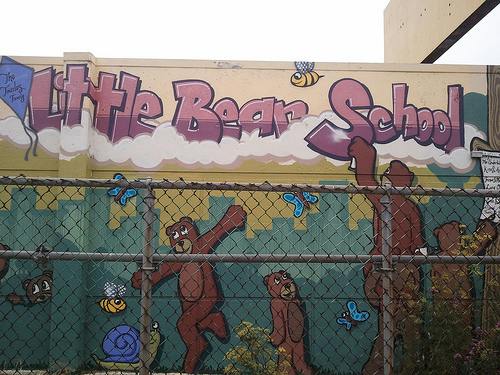 Mural with "Little Bear School" text and cartoon bears