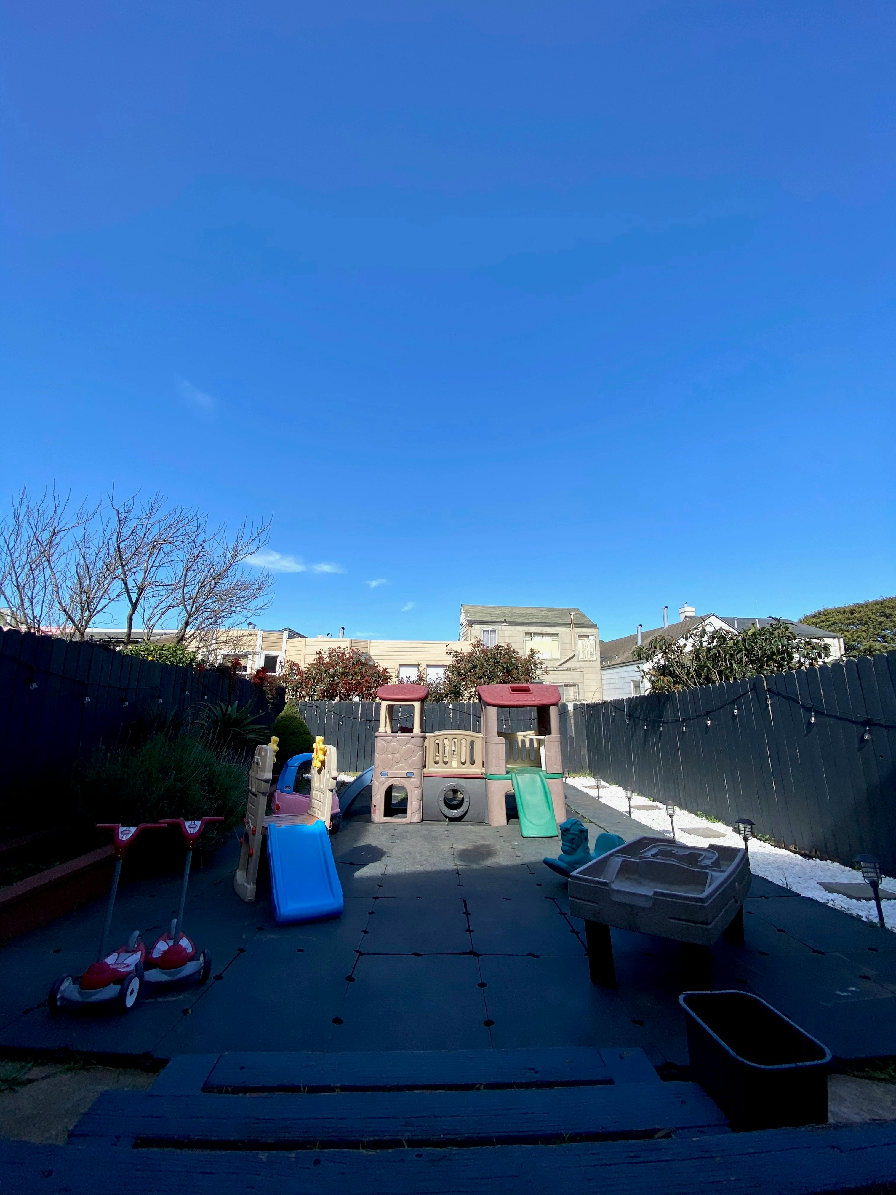 Outdoor playground with slides and swings