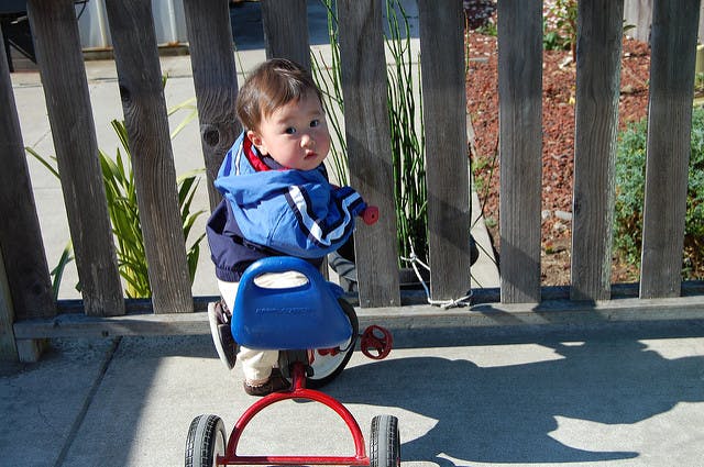 Child on a tricycle