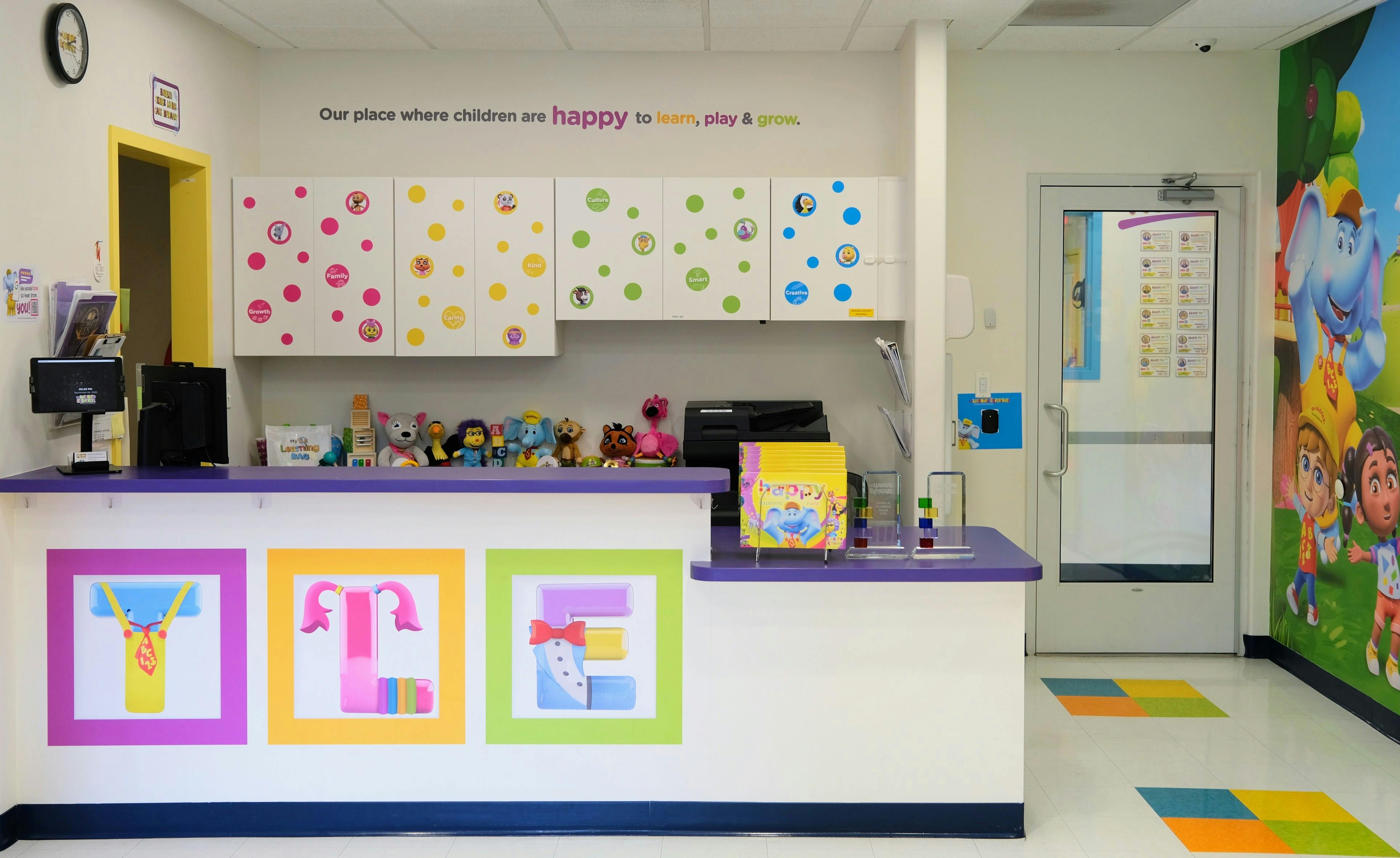 Reception desk with colorful letter blocks in a child development center